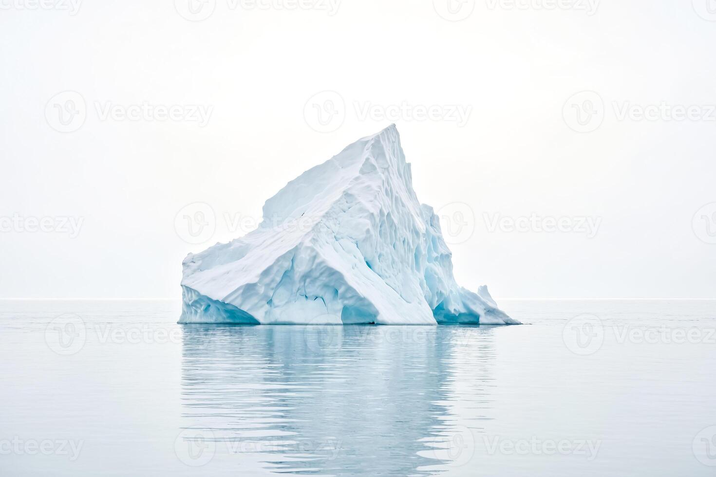 Single iceberg floating in calm waters photo