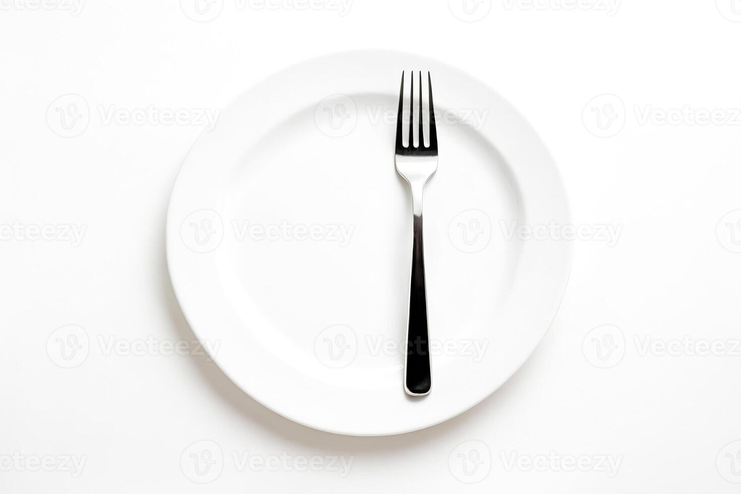 Fork on a white plate photo