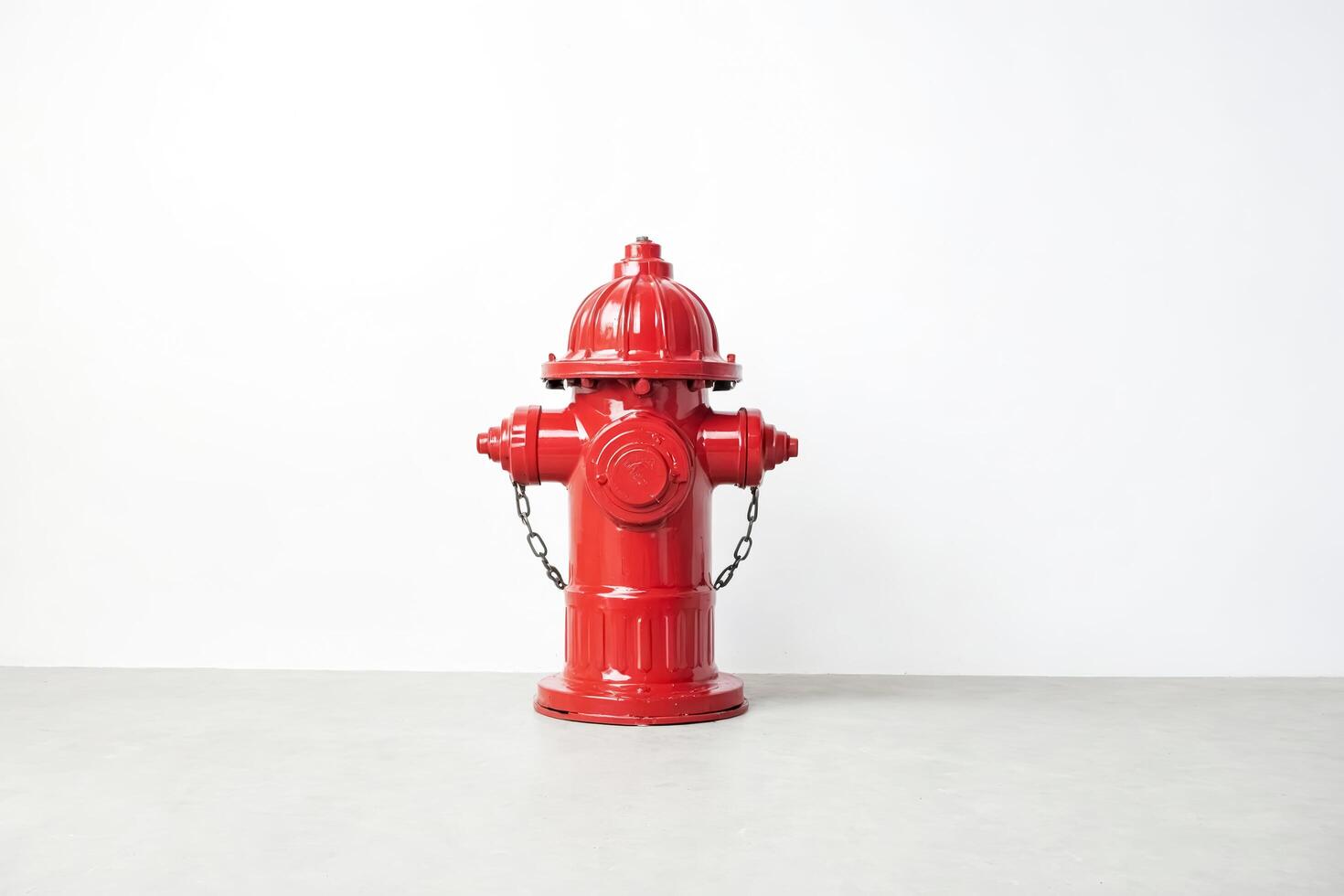 Red fire hydrant on a white background photo