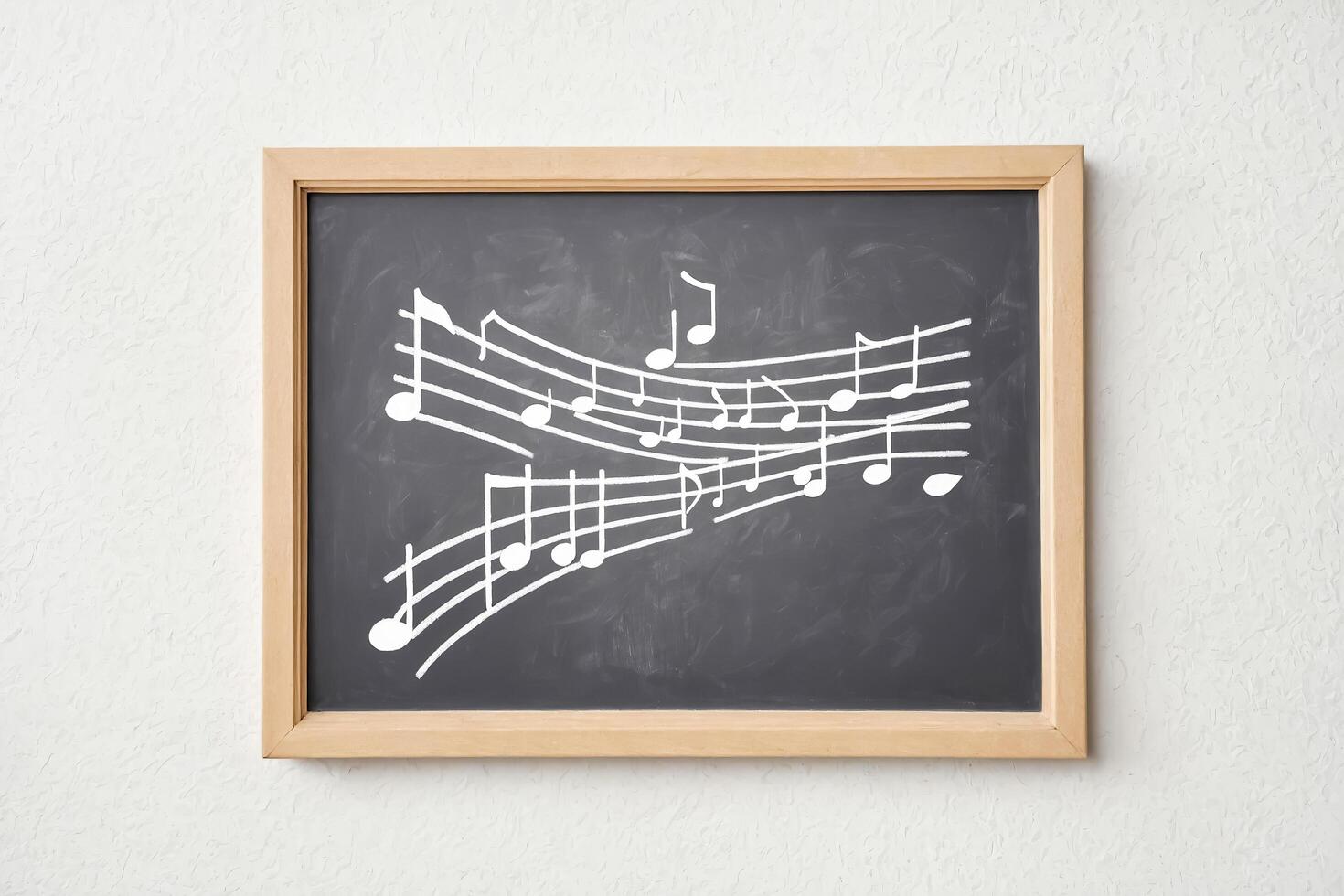 Blackboard with music notes photo
