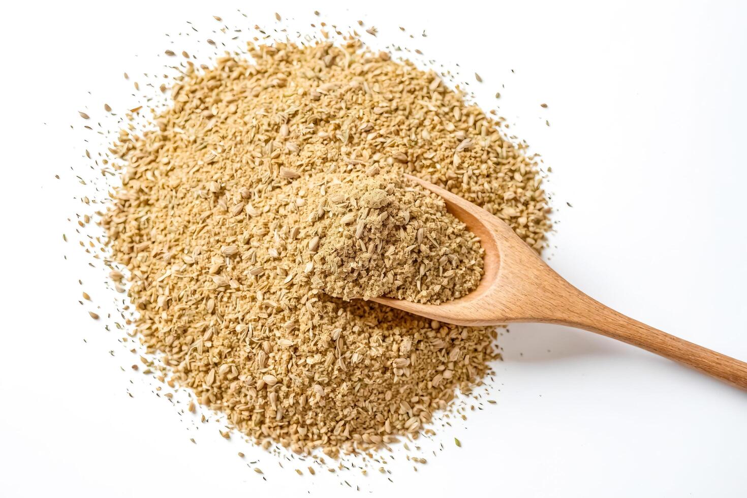 Dried Coriander Seeds In Wooden Spoon On White Background photo