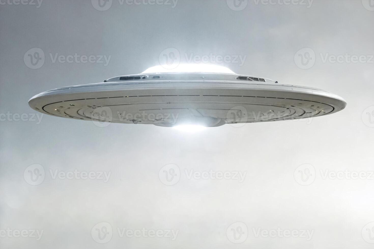 Enigmatic Encounter UFO Hovering in a Cloudy Sky photo