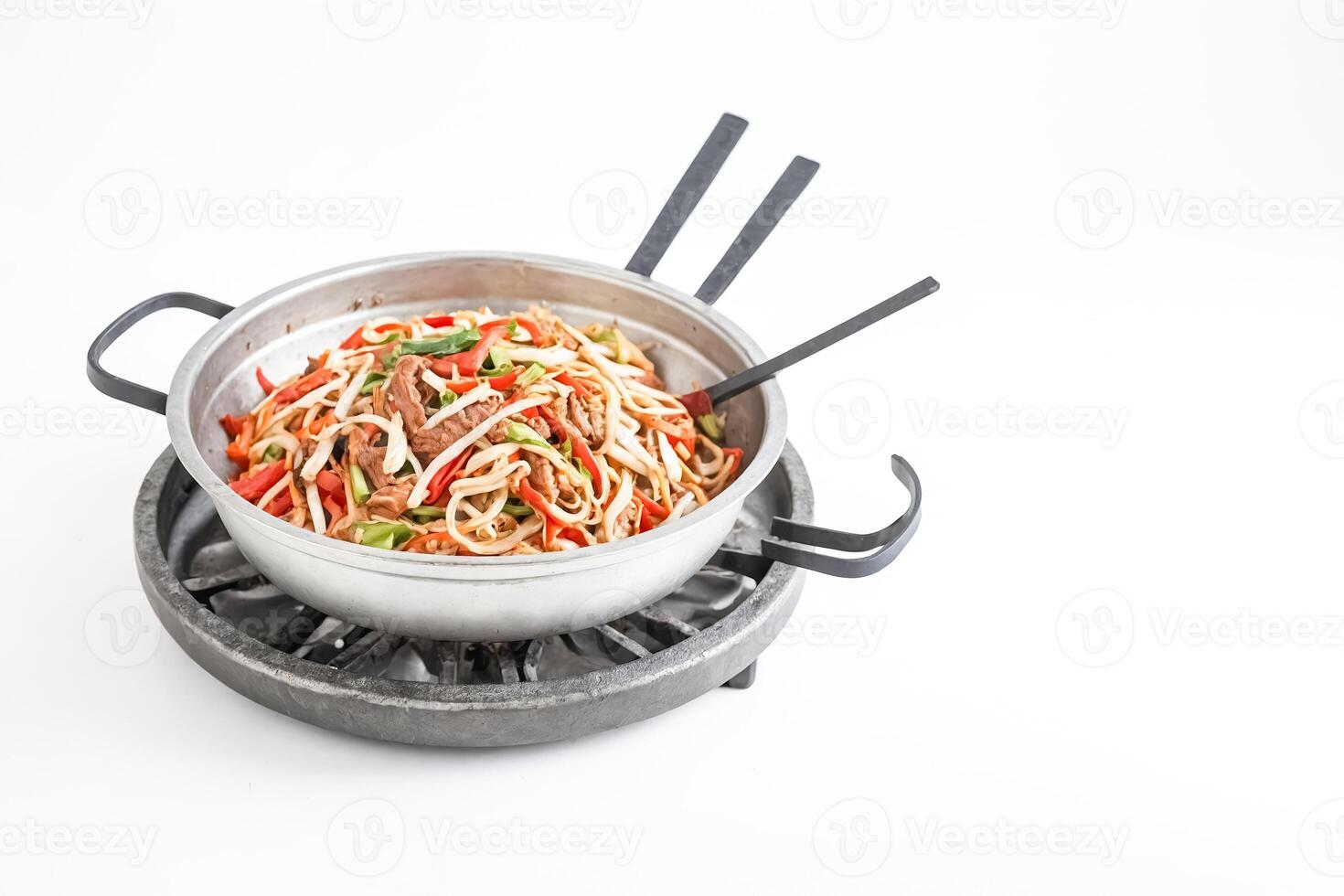 Stir-fried Noodles and Meat in a Wok on a White Background photo
