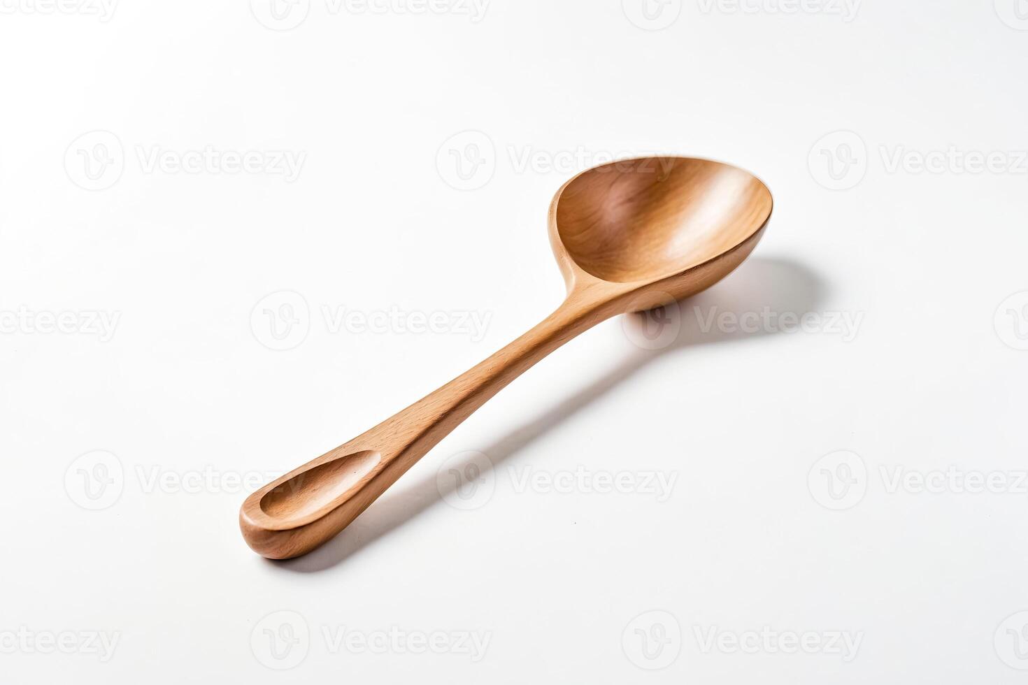 Wooden Ladle on White Background photo