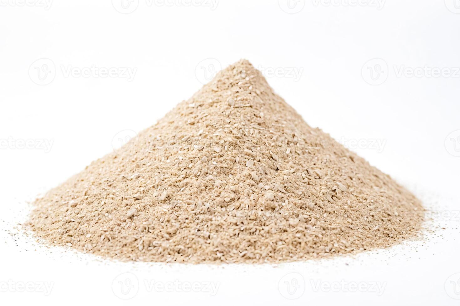 Pile of brown powder on white background photo
