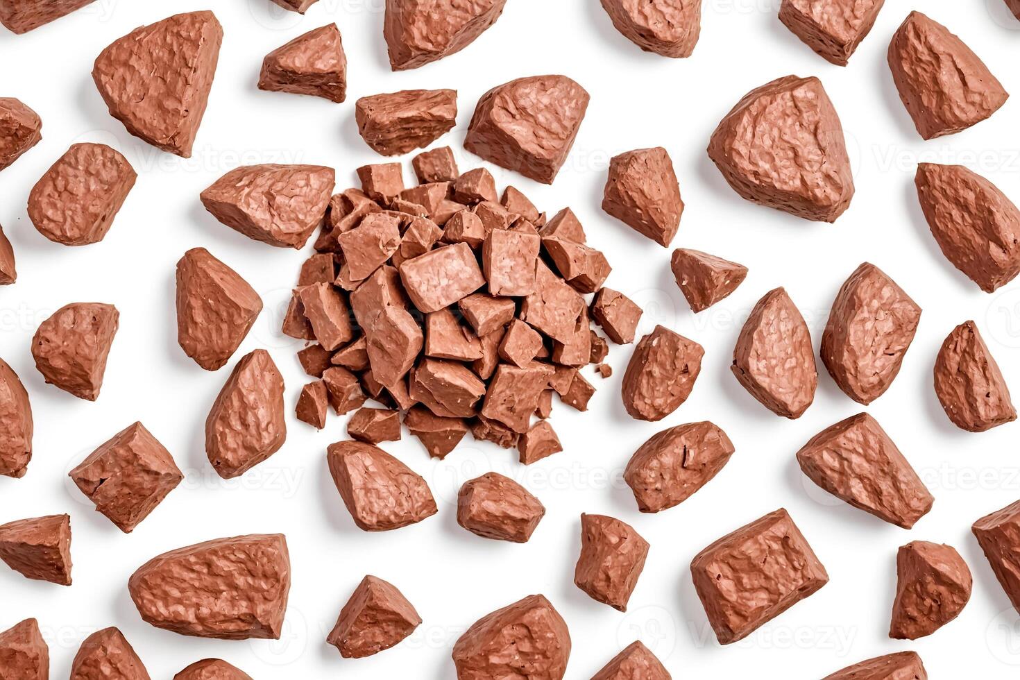 Chocolate pieces on a white background photo