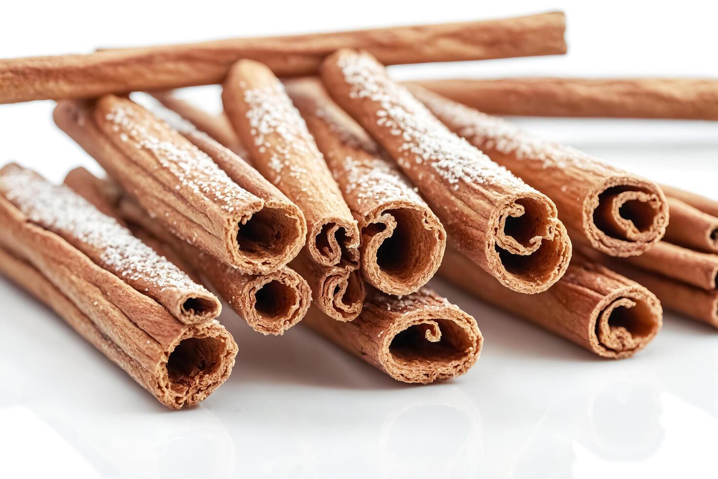 Close-up of Cinnamon Sticks with White Powder photo