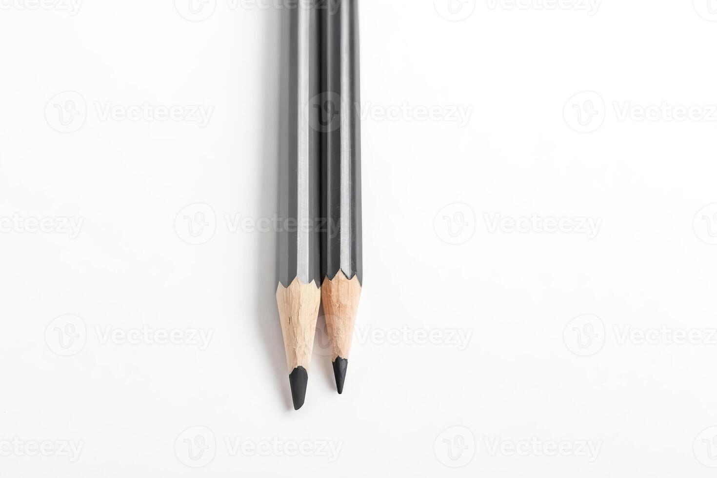 Two Graphite Pencils on White Background photo