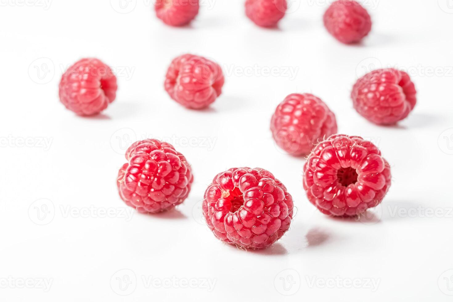Bunch of Raspberries on a White Surface photo