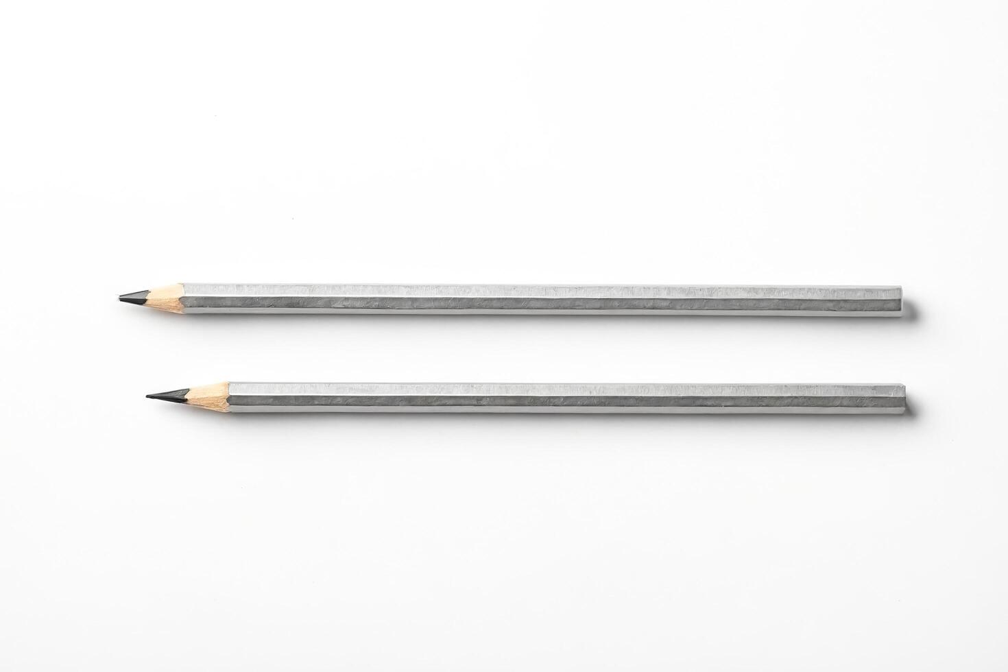 Two Silver Pencils on White Background photo