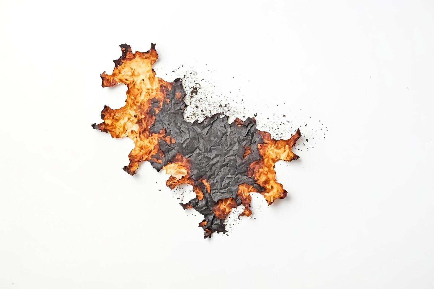 Burned Paper Isolated On White Background photo
