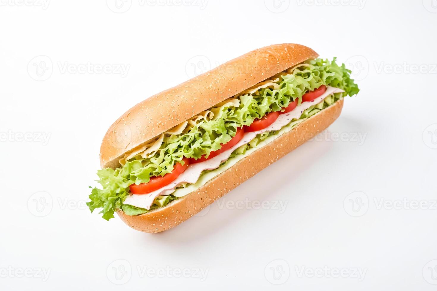 Close-up of a delicious sandwich with lettuce, tomato, and cheese on a white background photo