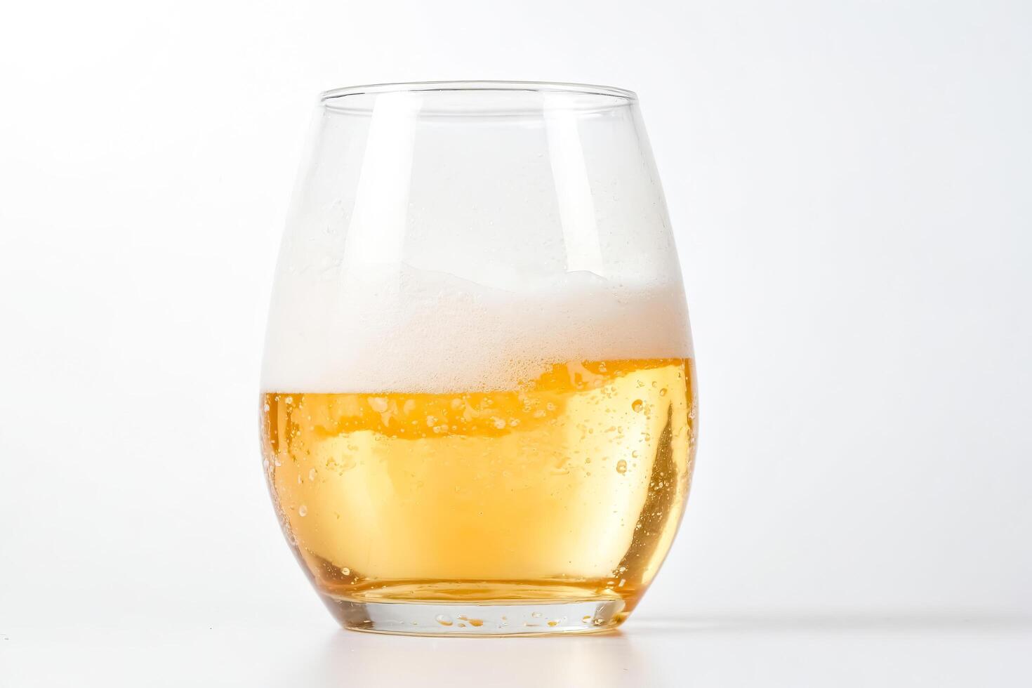 Glass of Beer with Foam photo