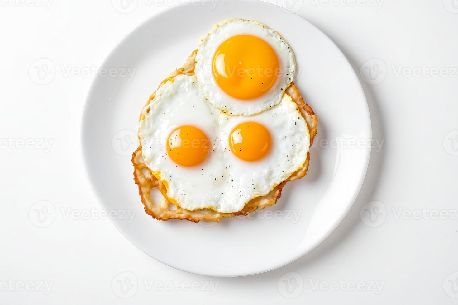 Three Fried Eggs on a Plate photo