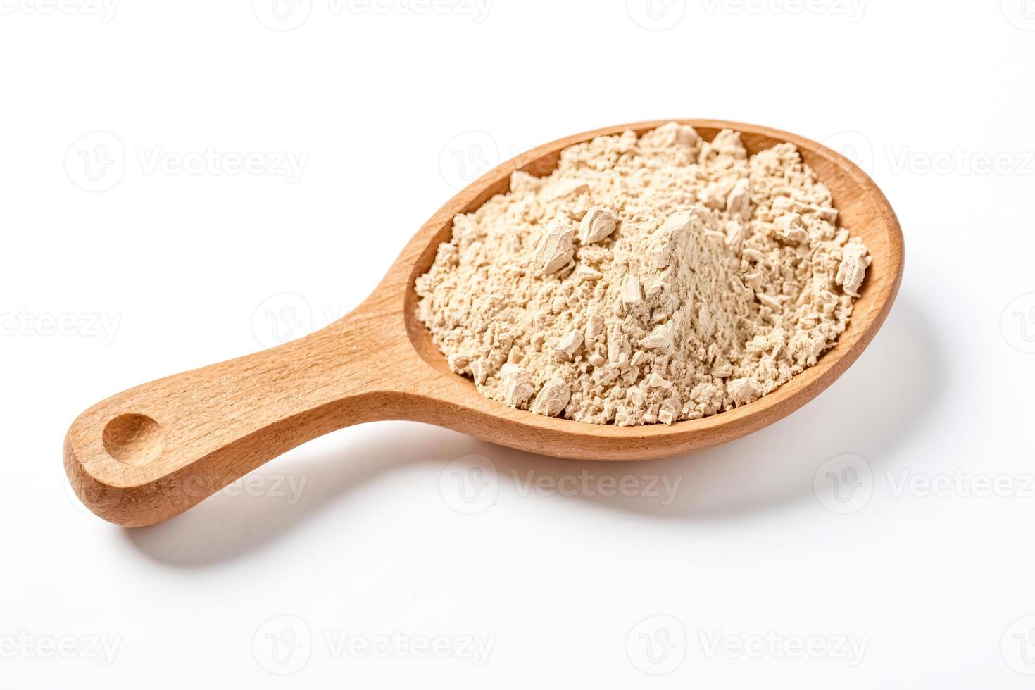 Close-up of Ashwagandha Powder in a Wooden Spoon photo