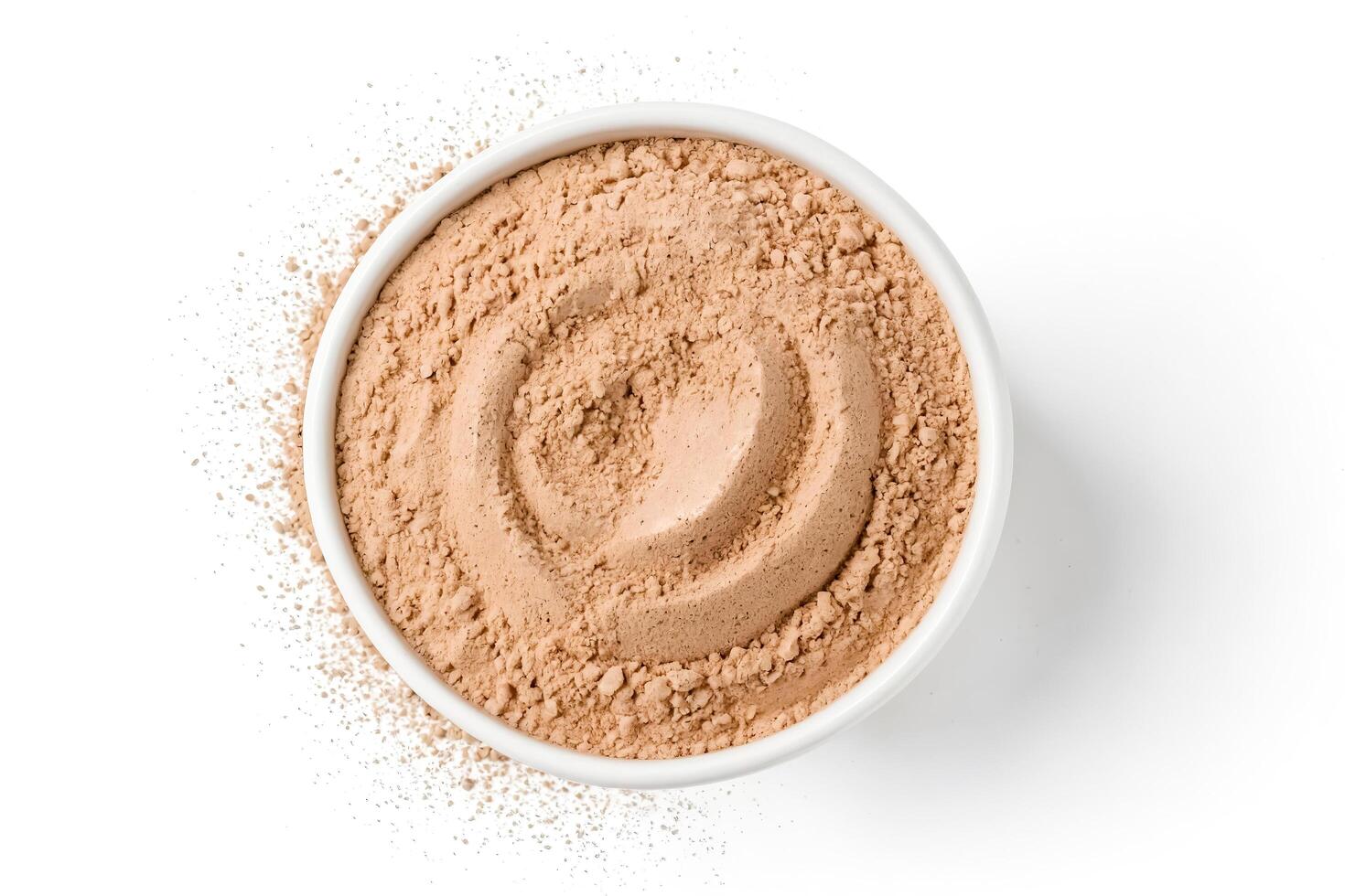 Brown Powder in a White Bowl photo