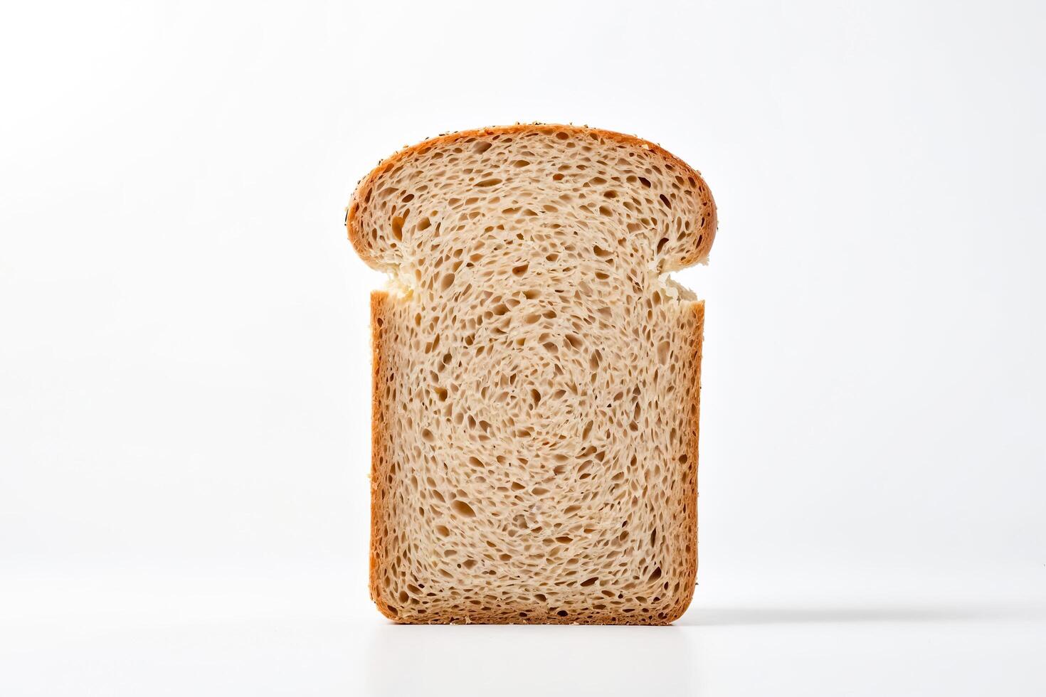 Closeup of a slice of bread with a white background photo