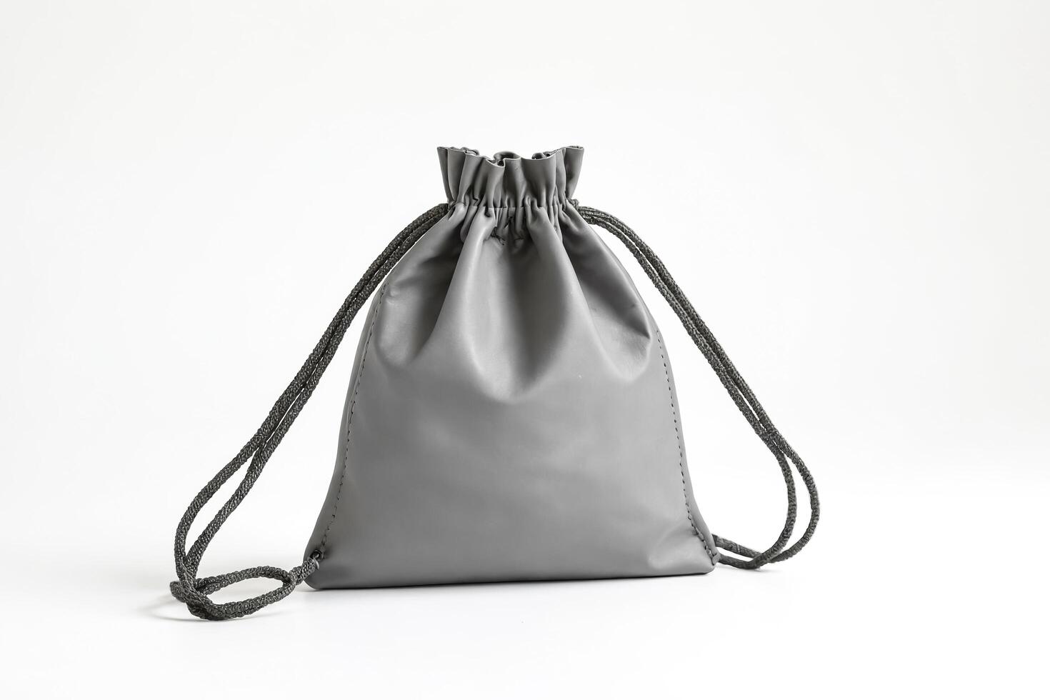 Gray Drawstring Bag on White Background photo