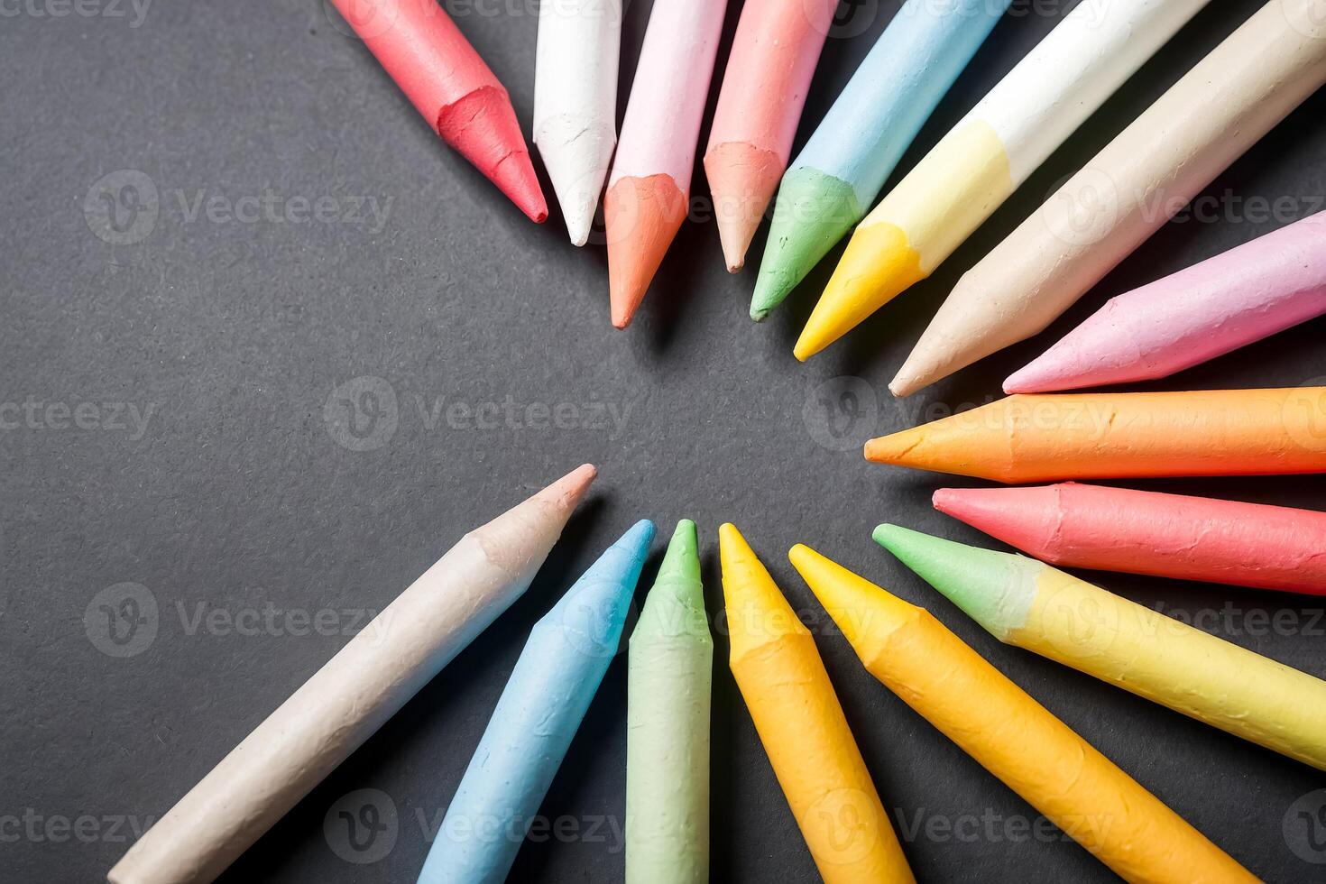 Colorful Chalk Sticks on Black Background photo
