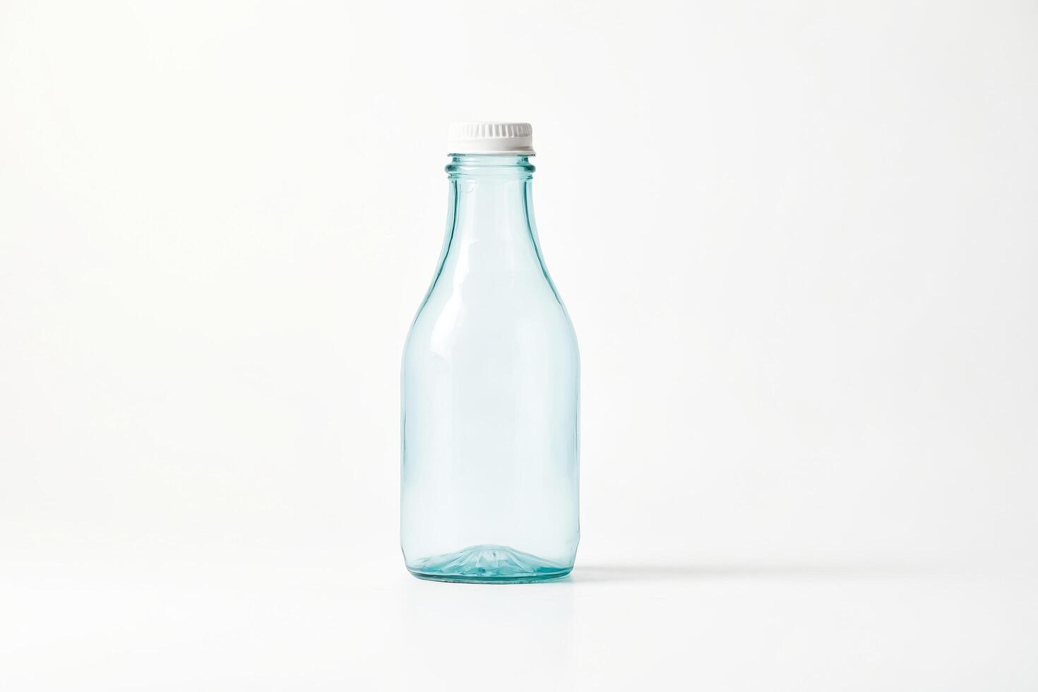 Empty Glass Bottle with White Lid on White Background photo