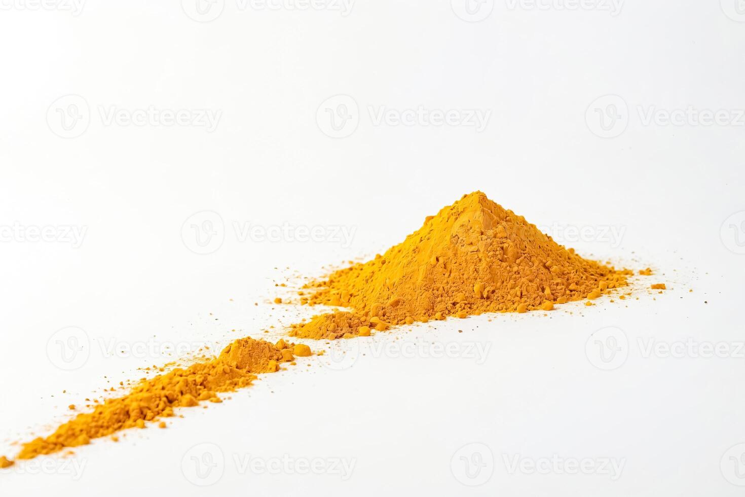 Pile of Yellow Powder on White Background photo
