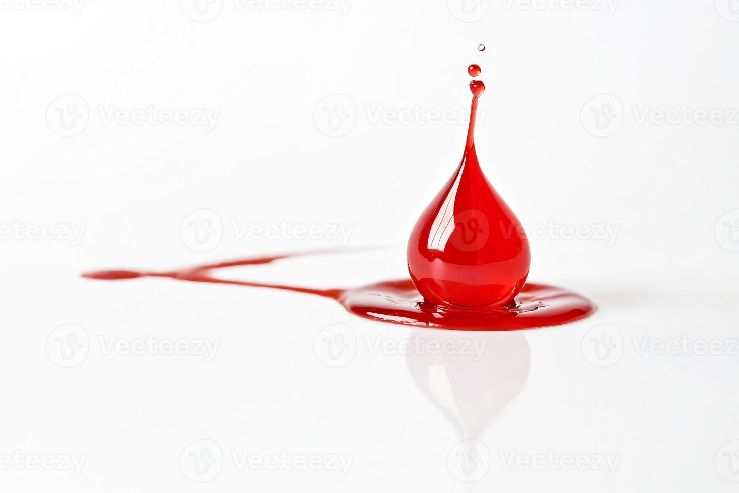 Red Water Drop Splashing on White Background photo