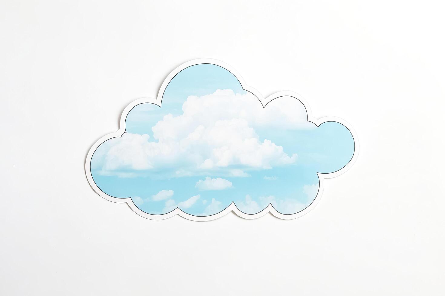 White background with blue sky and clouds inside of a cloud shape photo