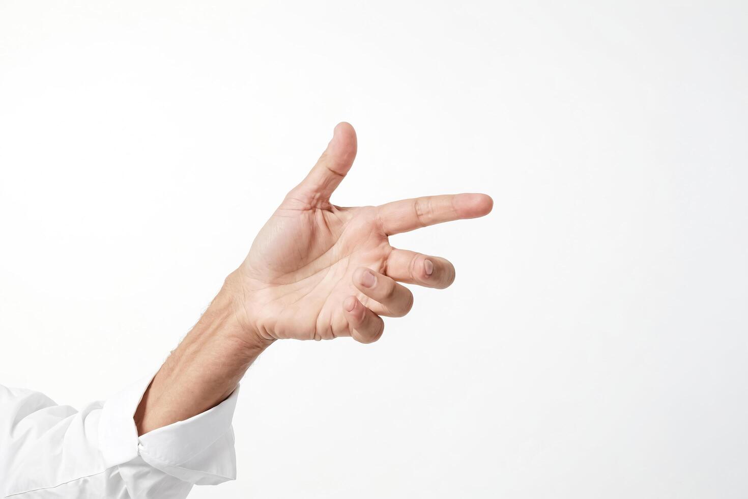 Close-up of a man's hand pointing to the right, isolated on a white background photo