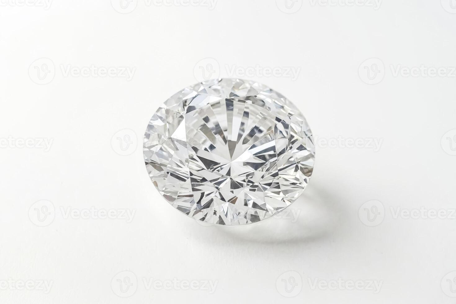 Close-up of a sparkling diamond on a white background photo