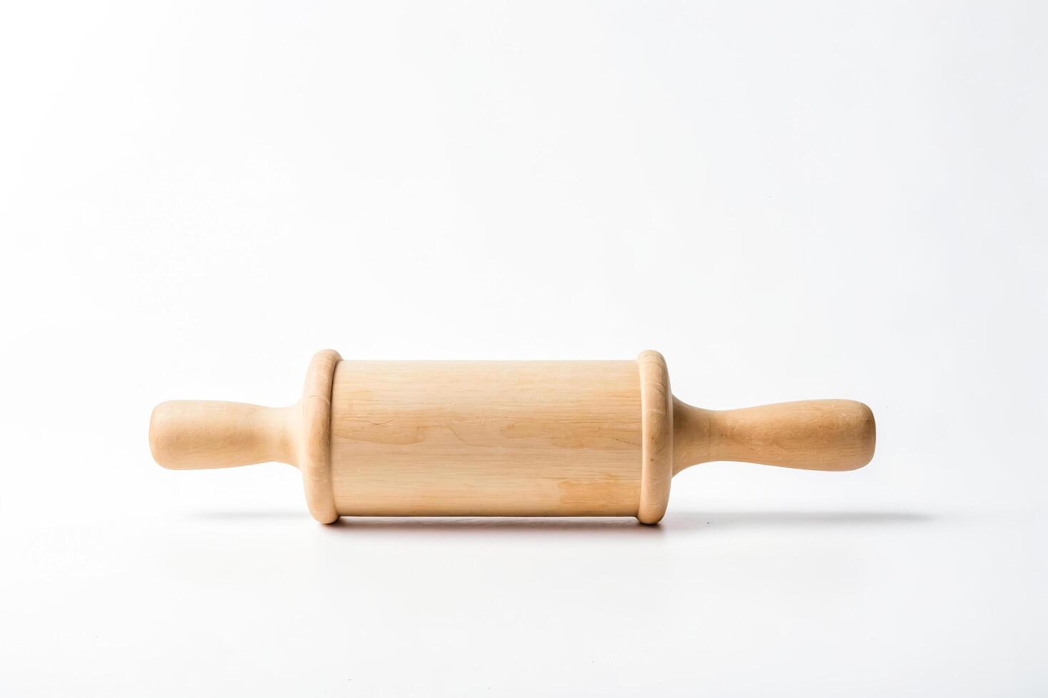 Wooden Rolling Pin on White Background photo