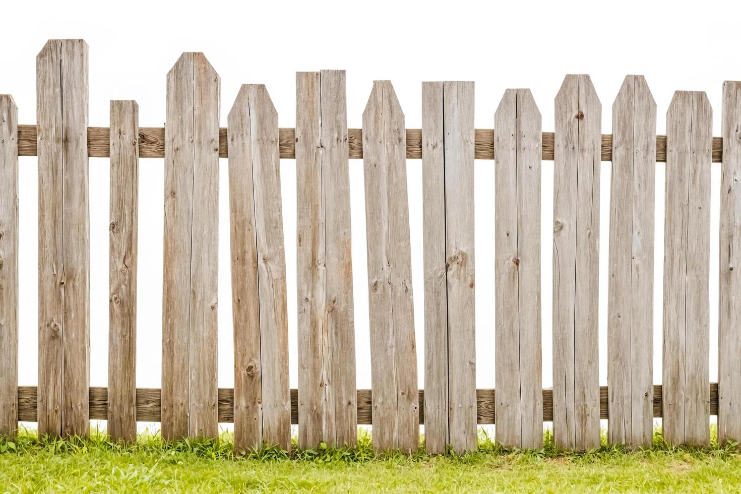 Rustic Wooden Fence with Green Grass photo
