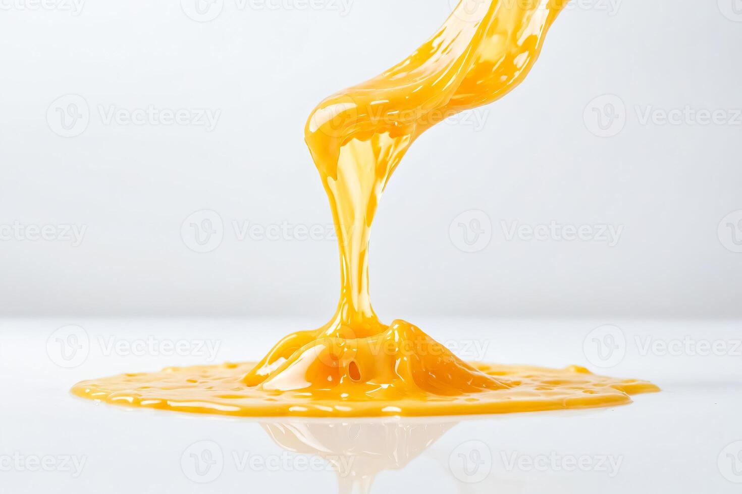 Close-up of a Yellow Liquid Splashing photo