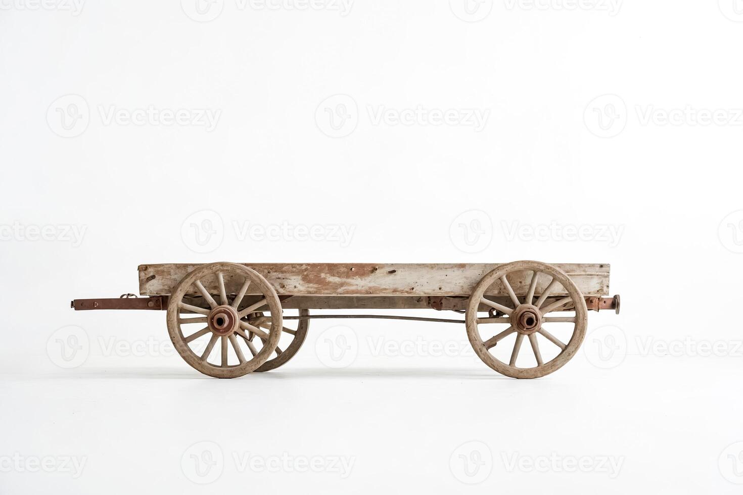 Wooden Cart with Wheels on White Background photo