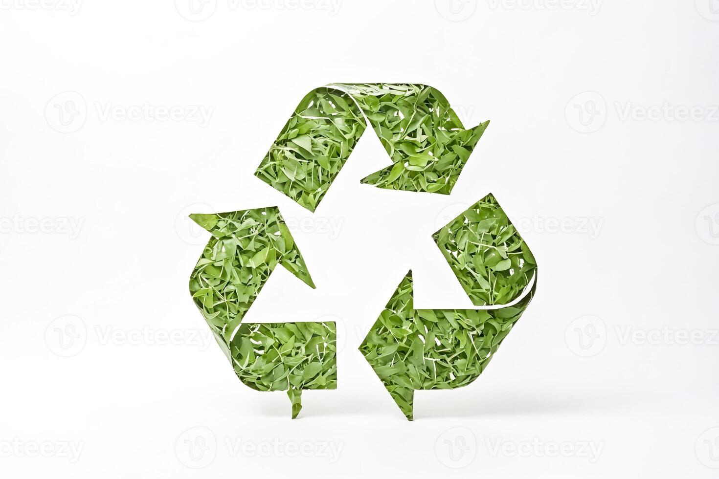 Green Recycling Symbol Made of Leaves photo