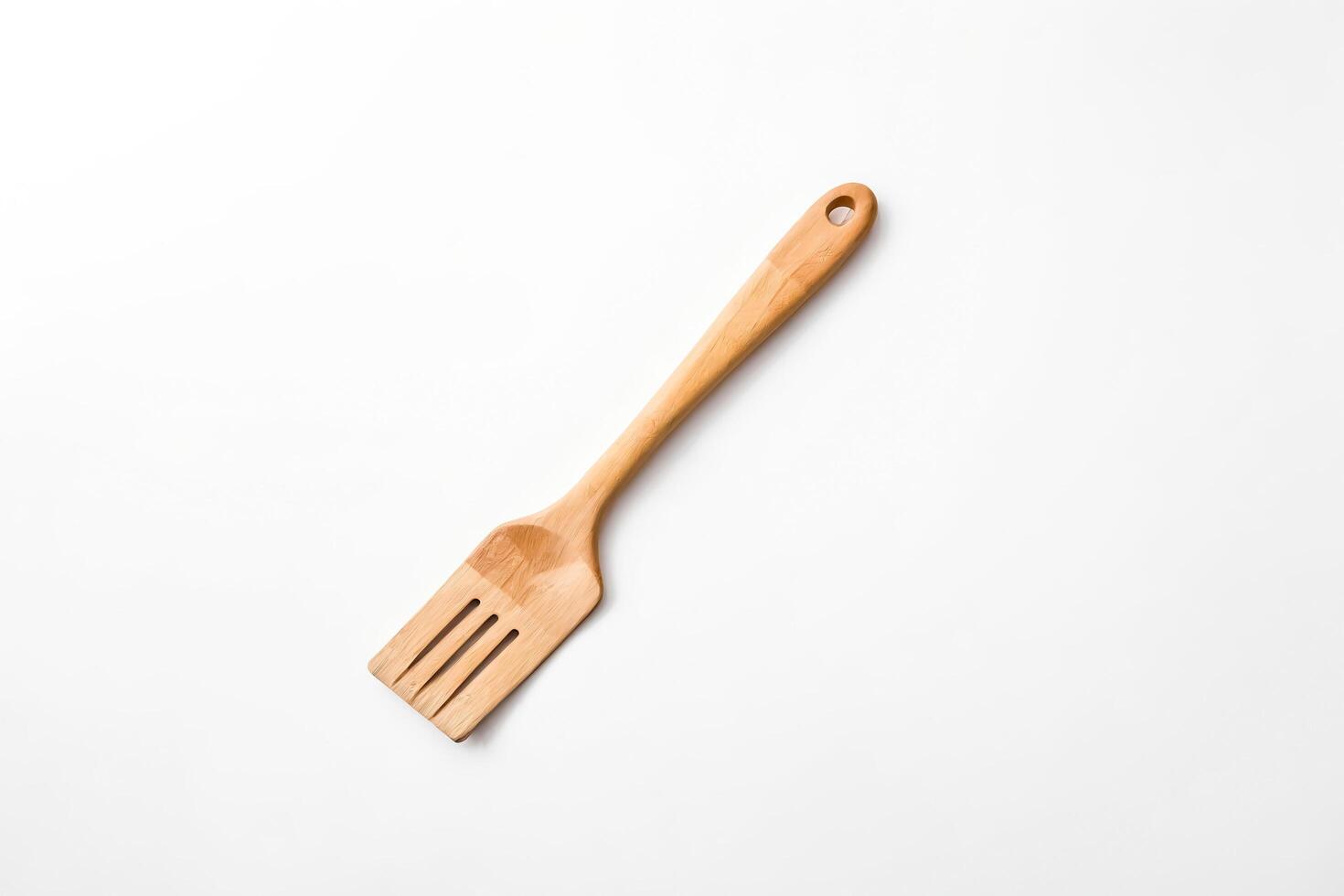 Wooden Spatula on White Background photo