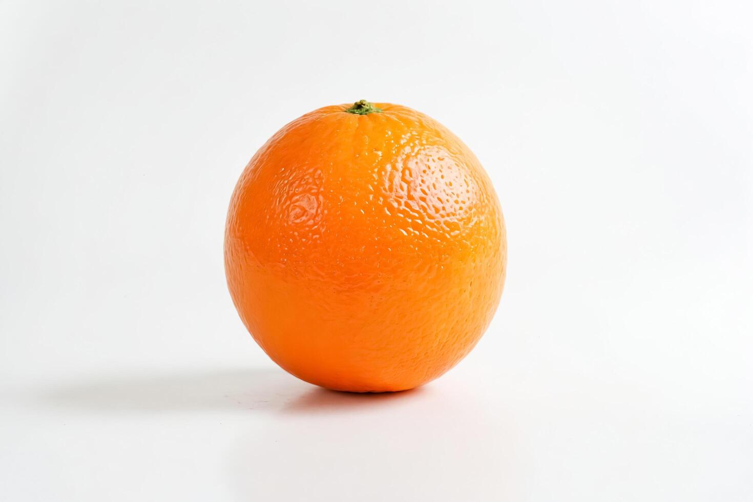 Single Orange on White Background photo