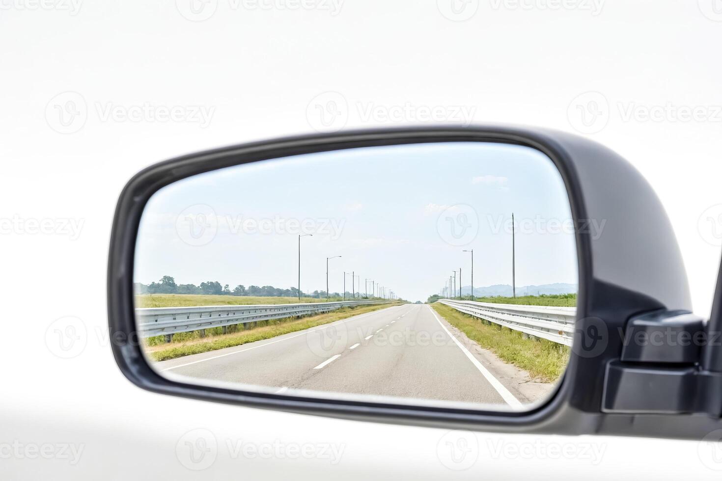 Empty Road in Rearview Mirror photo