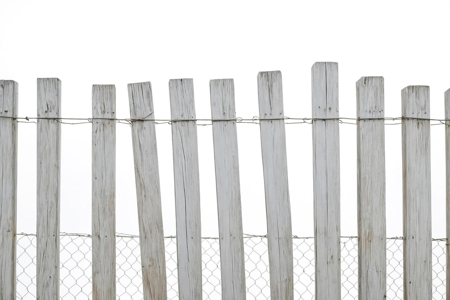 Weathered Wooden Fence with Chain Link photo