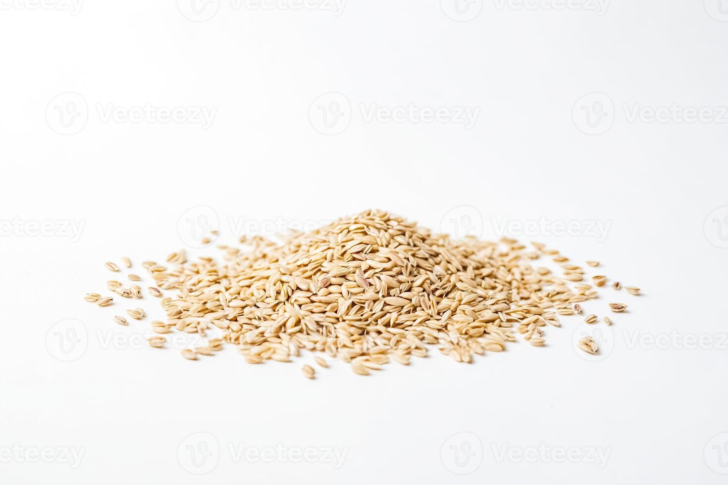 Oat Grain Scattered on White Background photo