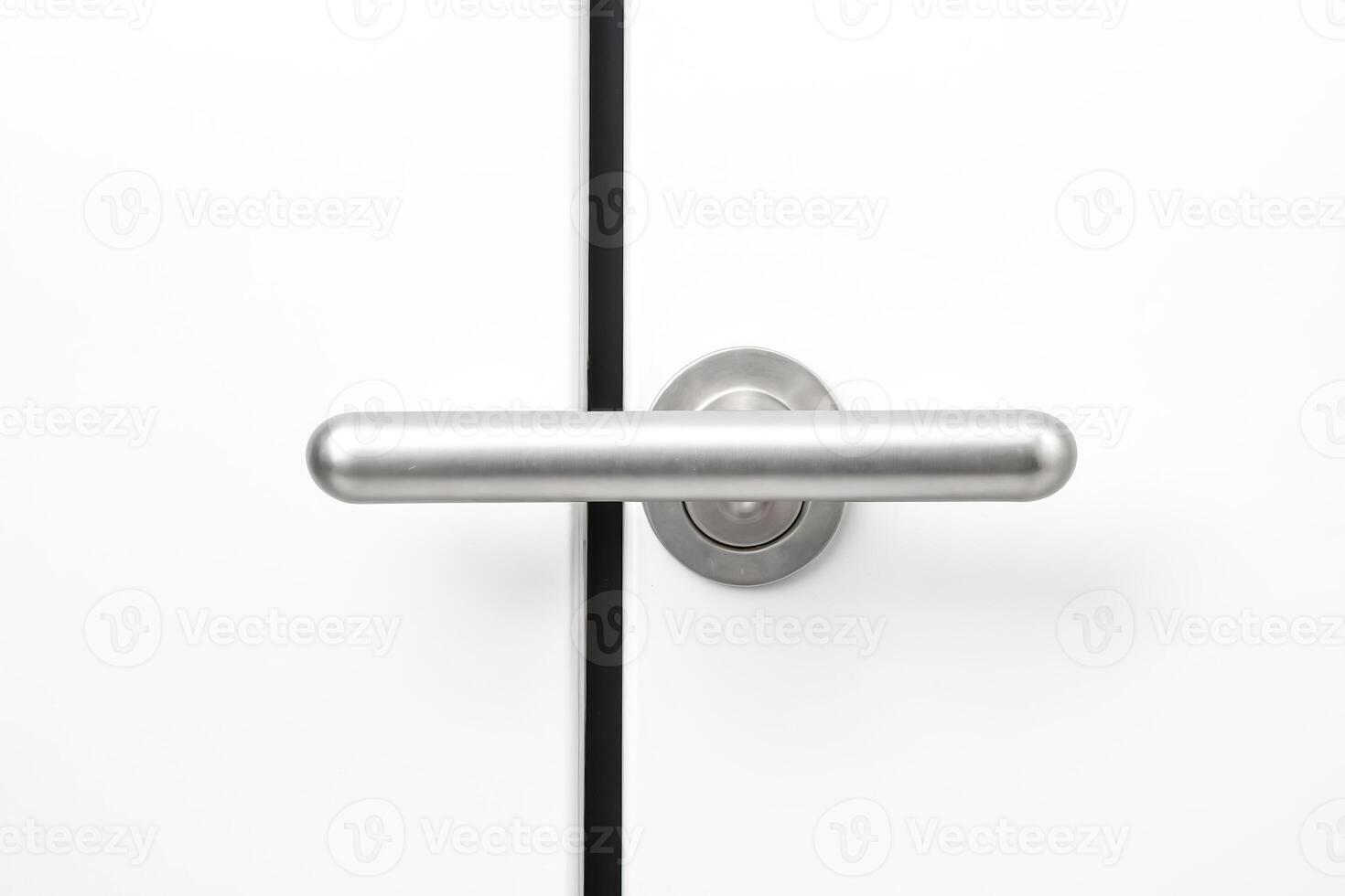 Modern Door Handle on White Door photo