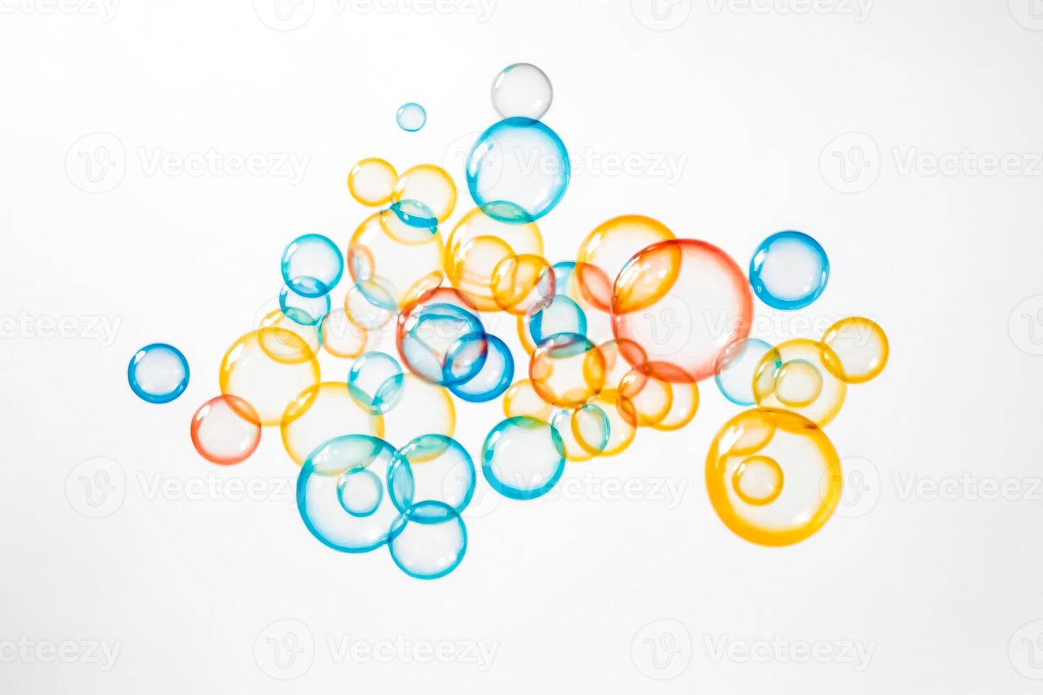Colorful Soap Bubbles Floating on a White Background photo