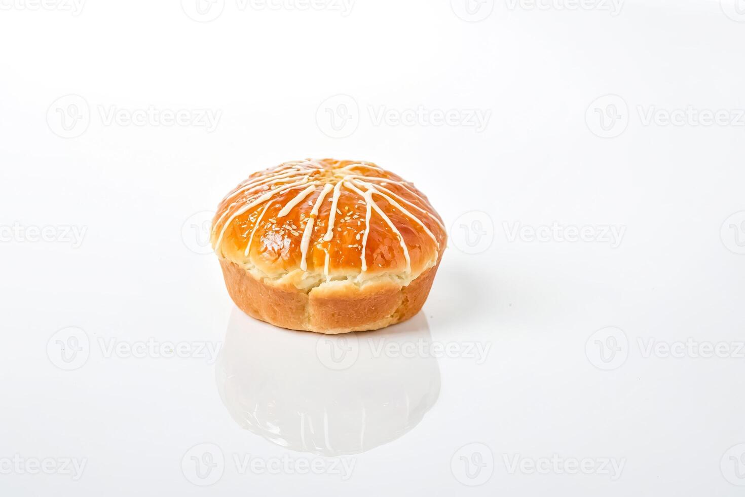 Glazed Pastry with White Drizzle photo
