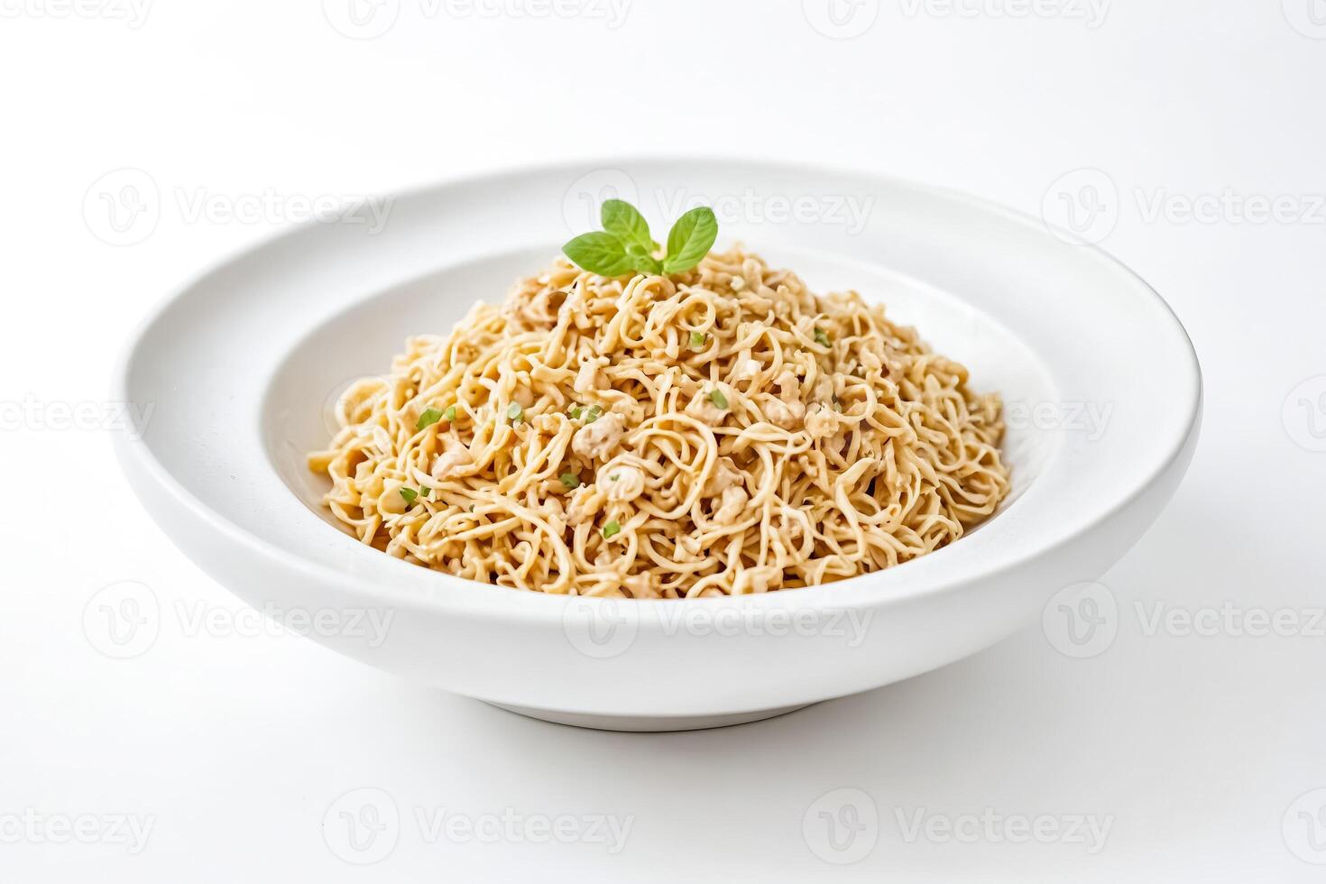 Closeup of a Plate of Noodles with Green Herbs photo