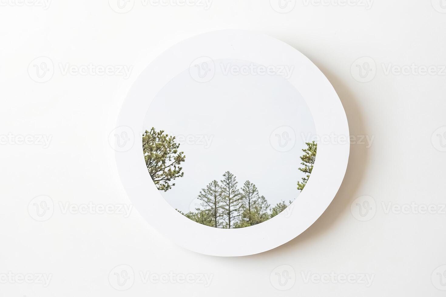 Round Window with View of Trees photo