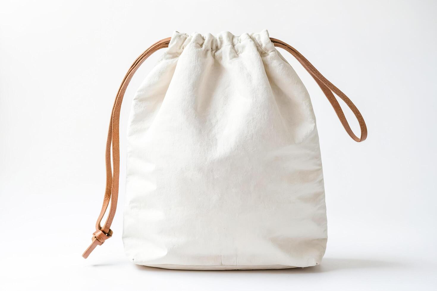 White Cotton Drawstring Bag with Leather Handles photo