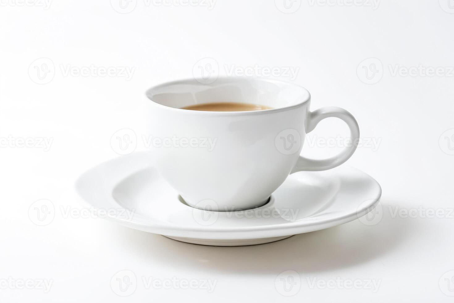 White Coffee Cup And Saucer With Beige Liquid photo