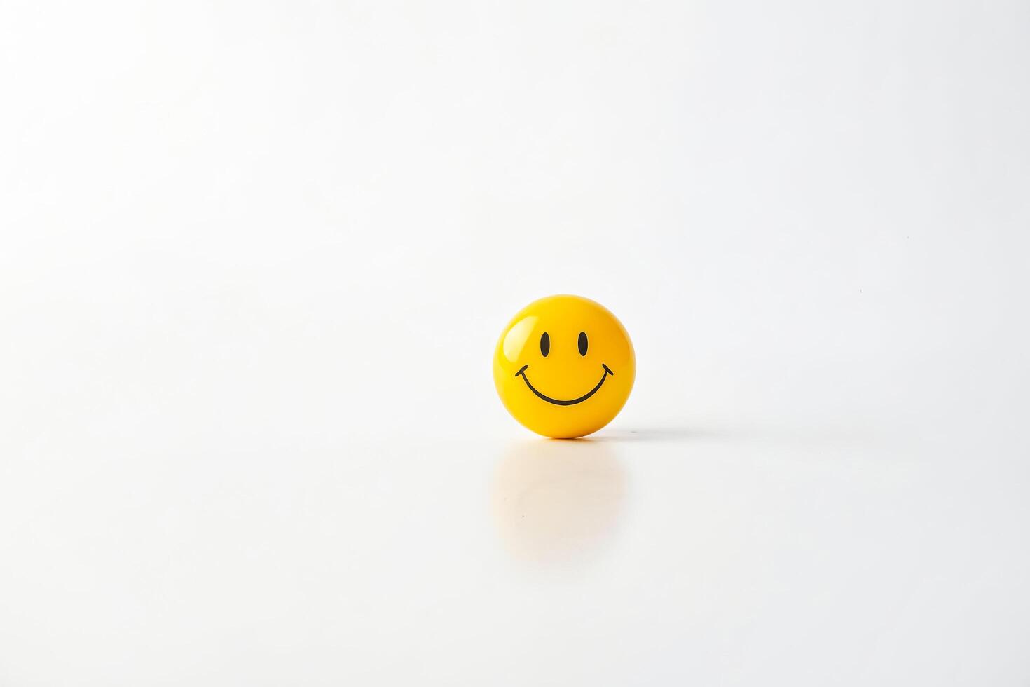 Yellow Smiley Face On White Background photo
