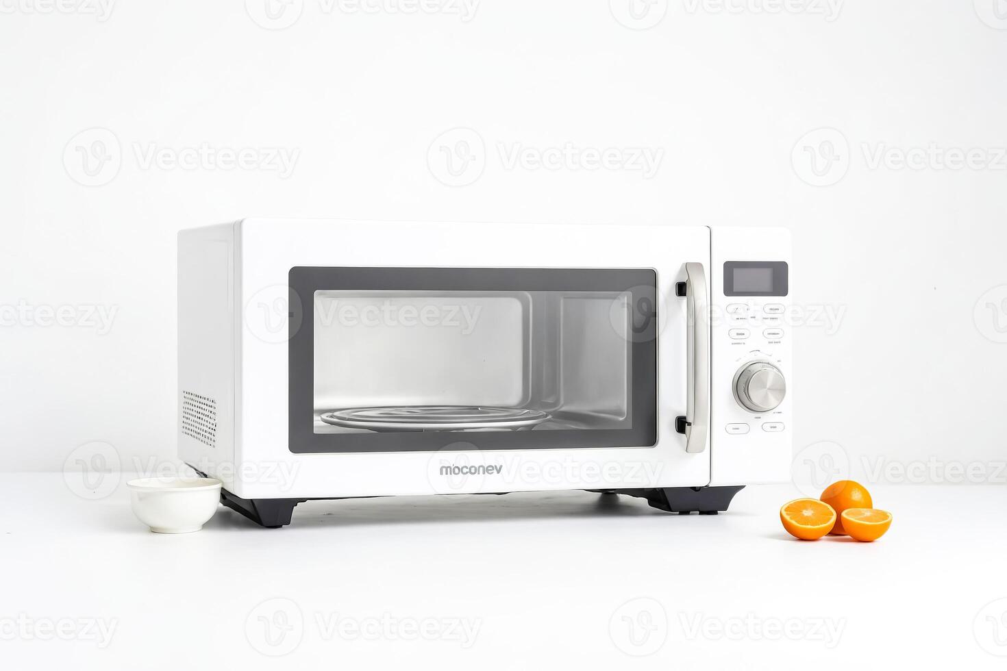 White Microwave Oven with Oranges photo