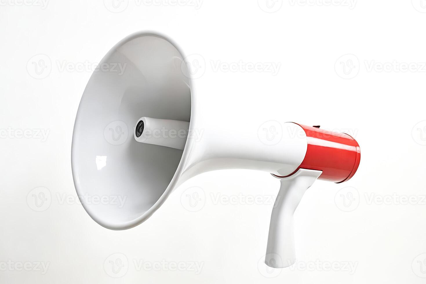 White megaphone with red handle on white background photo