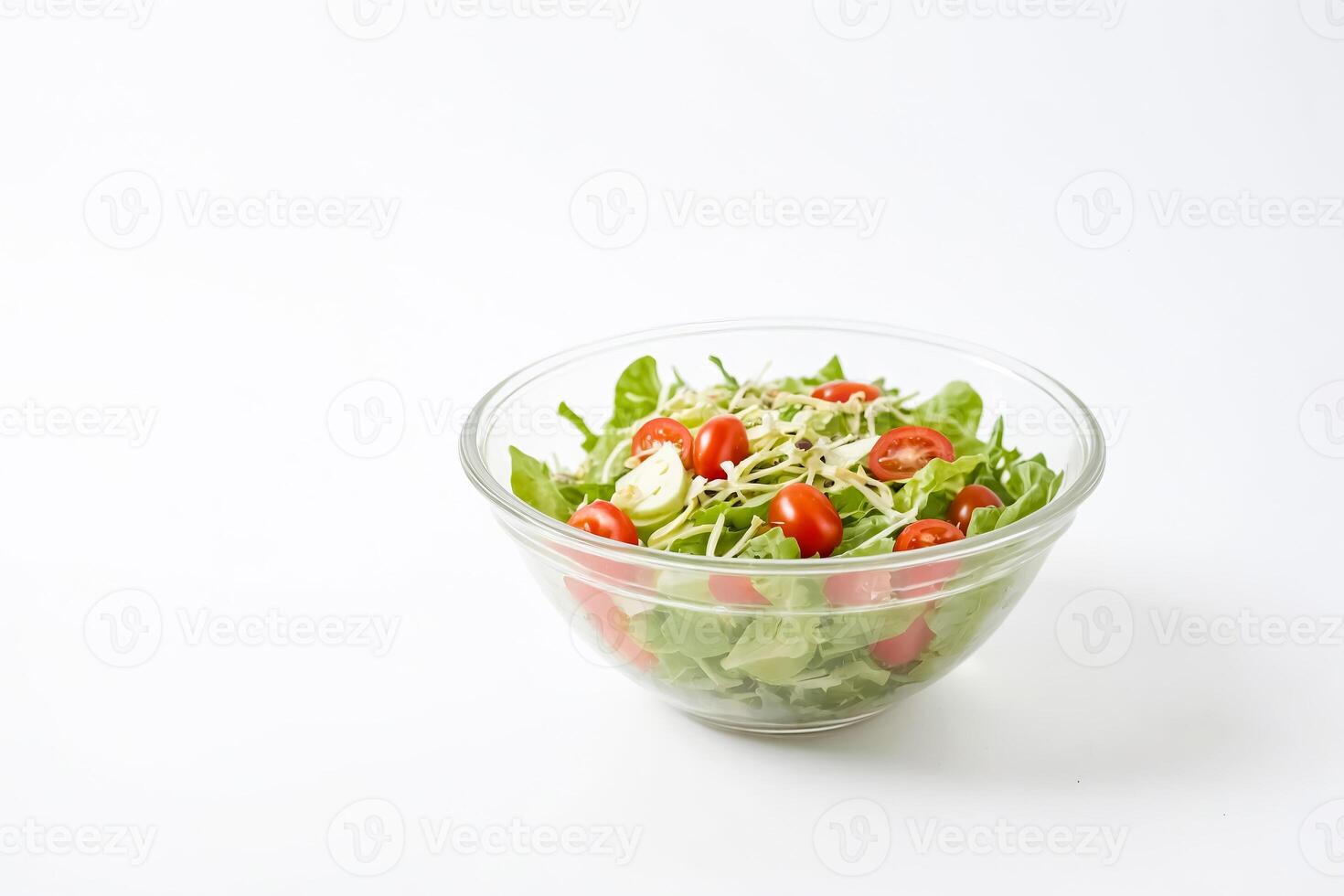 Fresh Salad in Glass Bowl on White Background photo